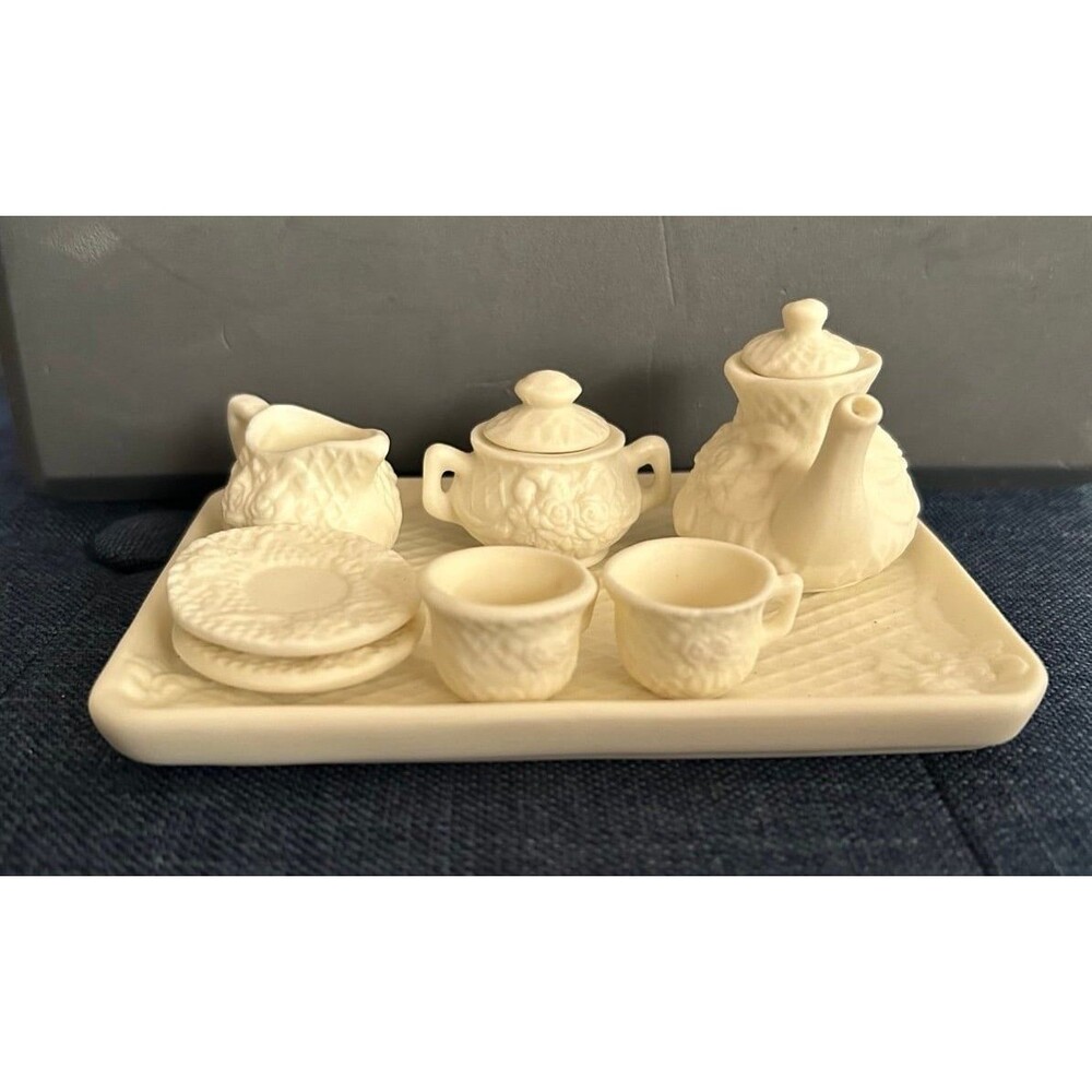 Vintage Porcelain Bisque Miniature Tea Set eight pieces with two saucer